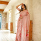Elegant pink luxury statement saree for special occasions featuring floral embroidery and soft drape
