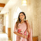 Stunning Stylera luxury statement saree for special occasions with floral embroidery in a soft pink hue