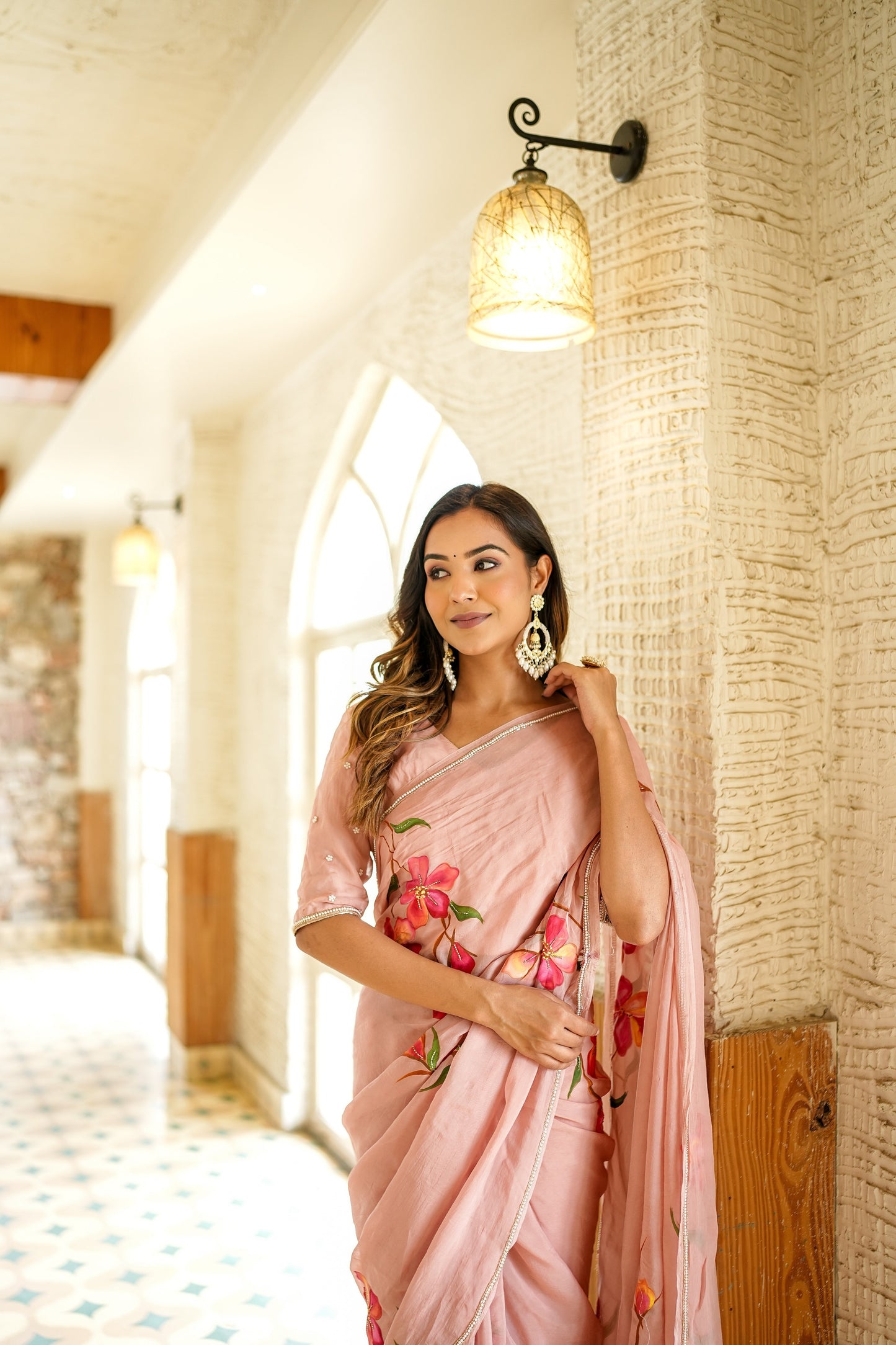 Stunning Stylera luxury statement saree for special occasions with floral embroidery in a soft pink hue