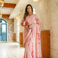 Elegant woman wearing a luxury statement saree for special occasions with floral embroidery