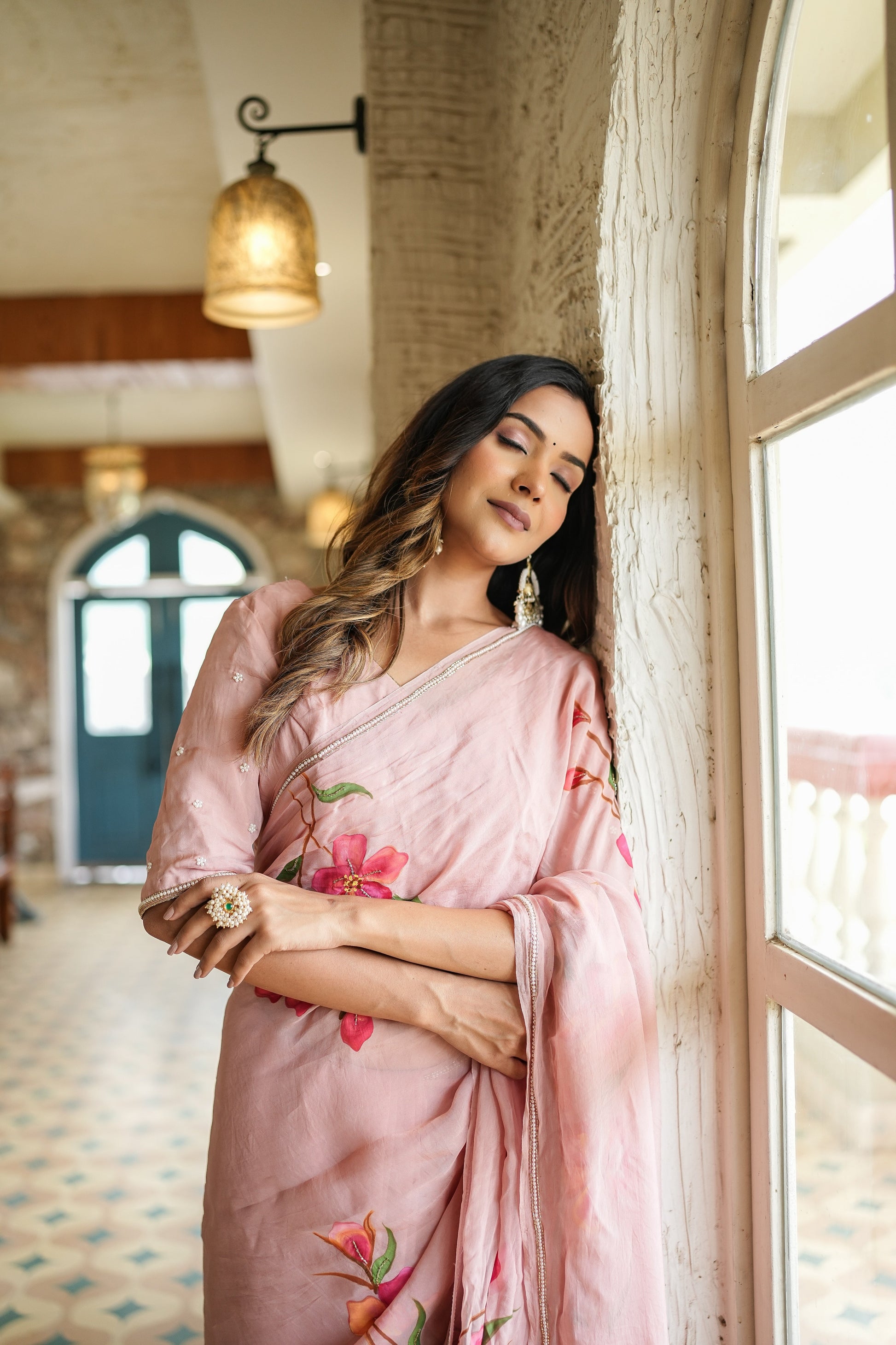 Elegant Stylera luxury statement saree for special occasions in pink with floral embroidery