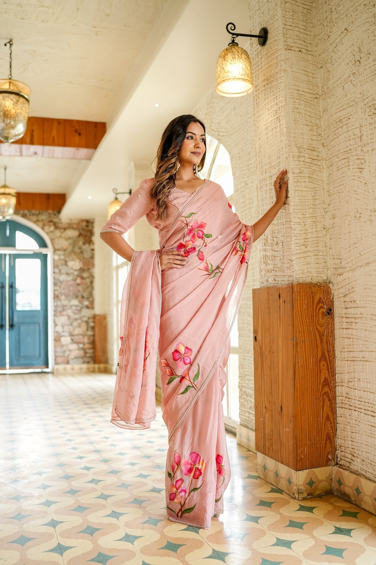 Stylera luxury statement saree for special occasions in soft pink with floral prints