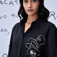Stylera black button up shirt featuring white Mad Hatter illustration worn by model Mad Hatter wool shirt