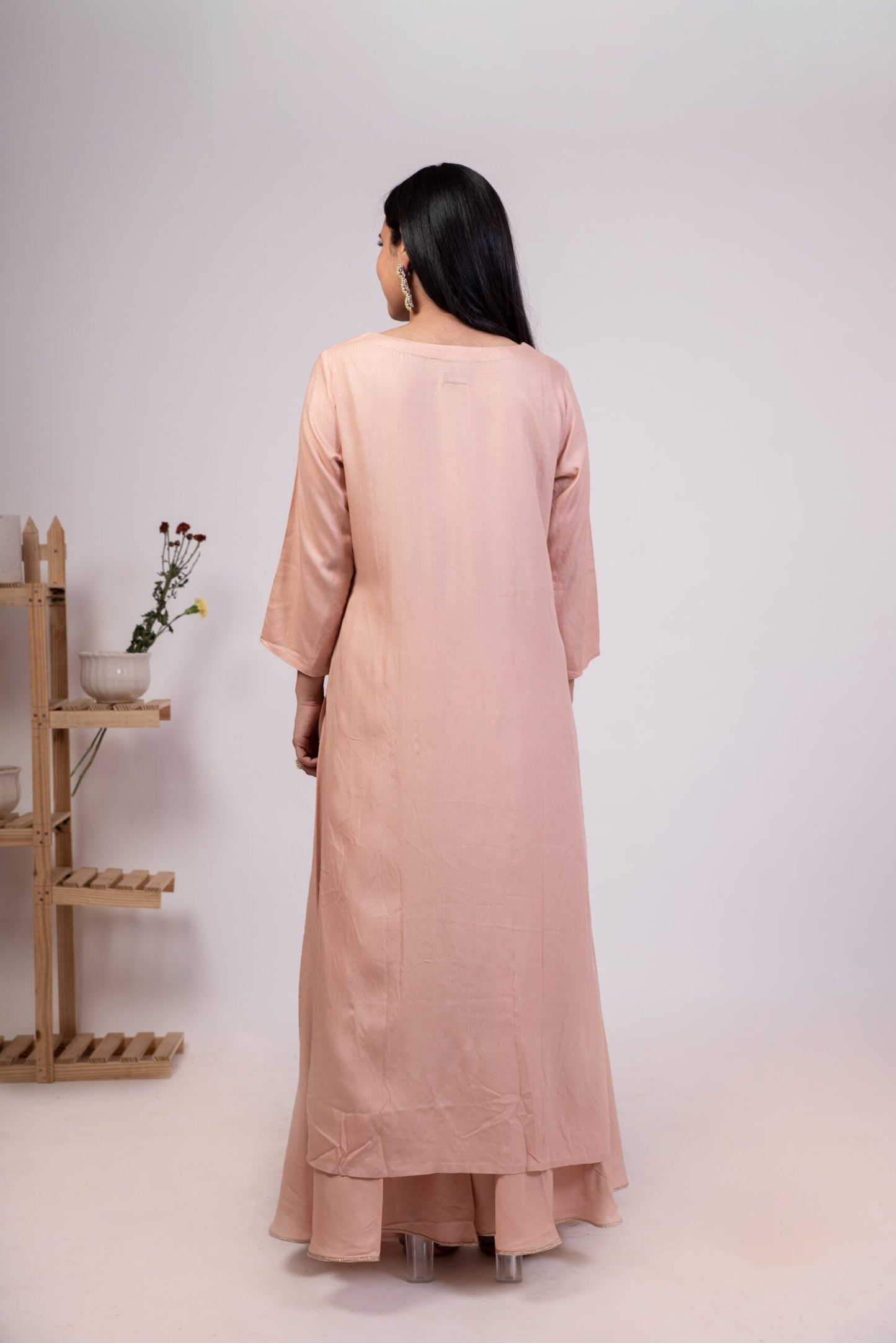 Elegant mauve pink kurta palazzo set with a flowing design, perfect for casual or festive occasions