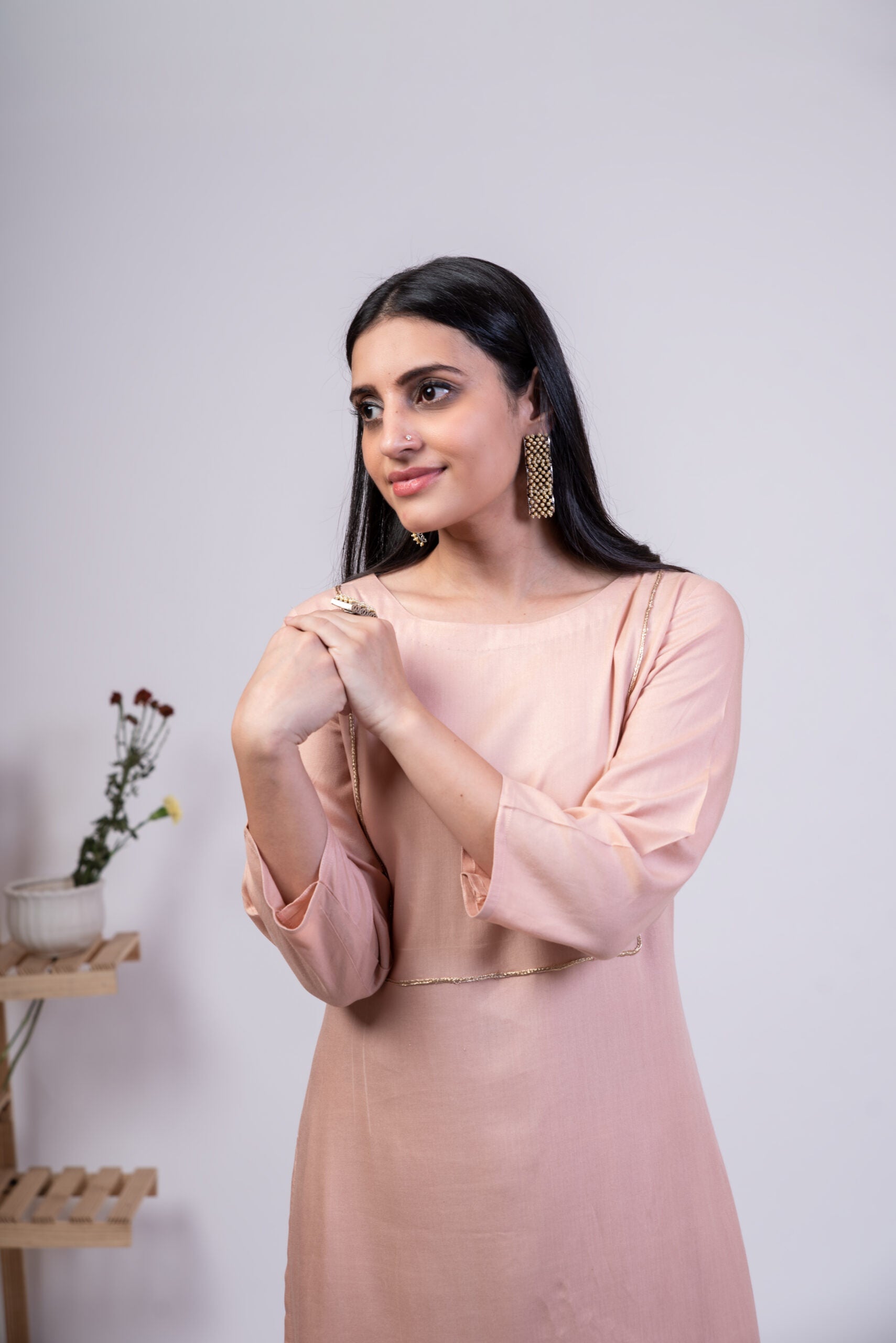 Elegant mauve pink kurta palazzo set featuring a stylish design and breathable fabric for comfort