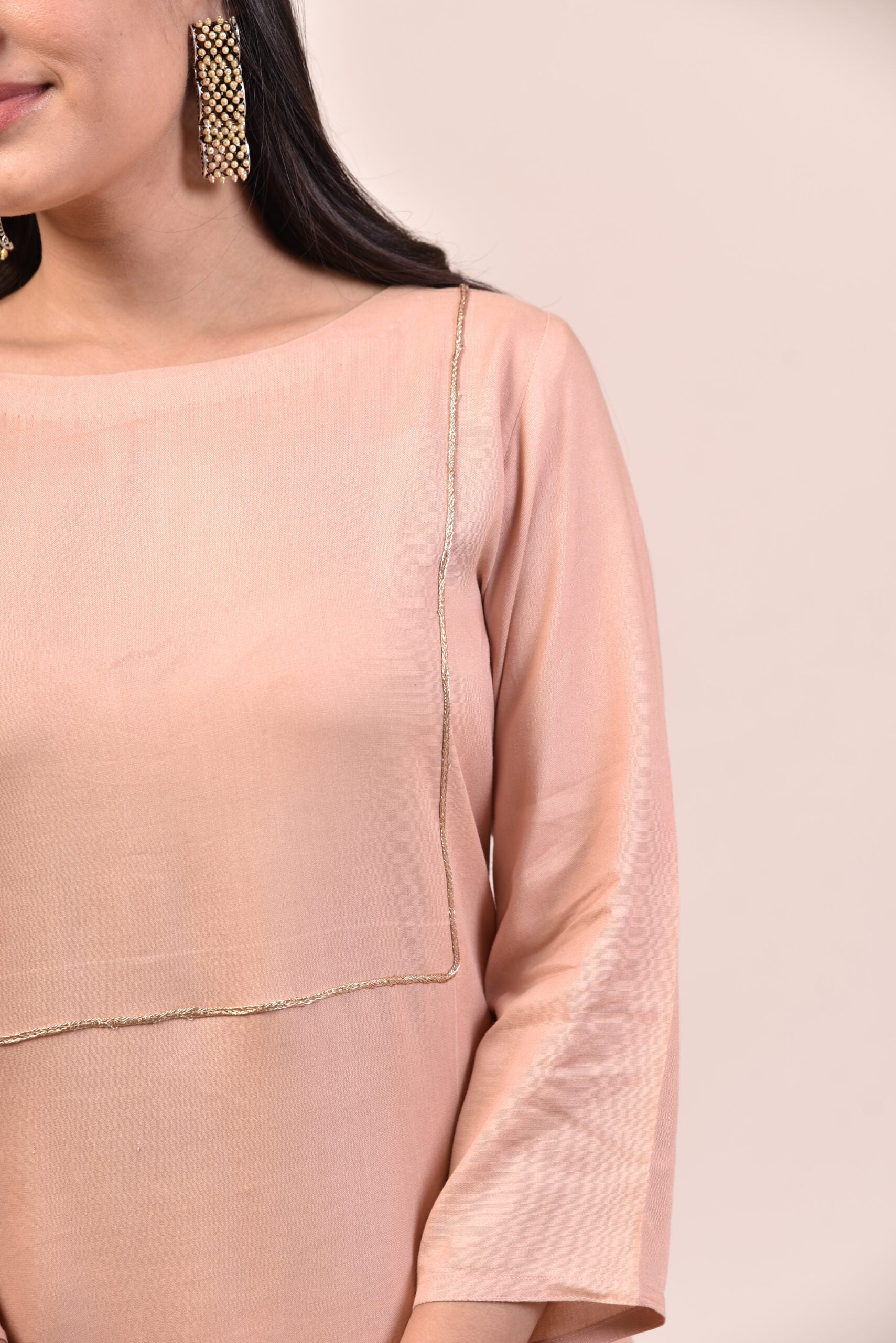 Elegant mauve pink kurta palazzo set featuring delicate finishing and stylish design