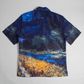 Back view of Stylera men's artistic print shirt featuring blue starry night landscape with orange meadow