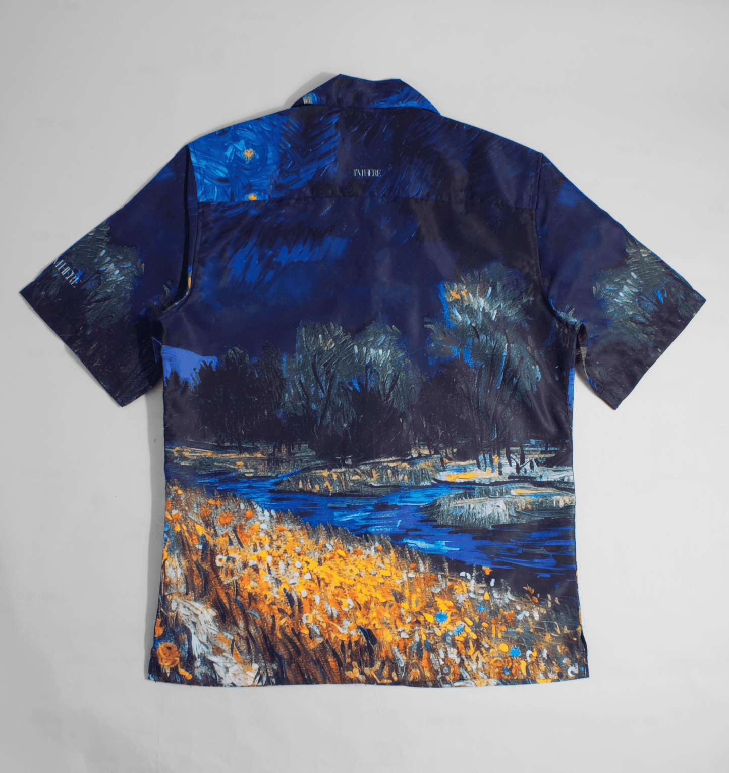 Back view of Stylera men's artistic print shirt featuring blue starry night landscape with orange meadow