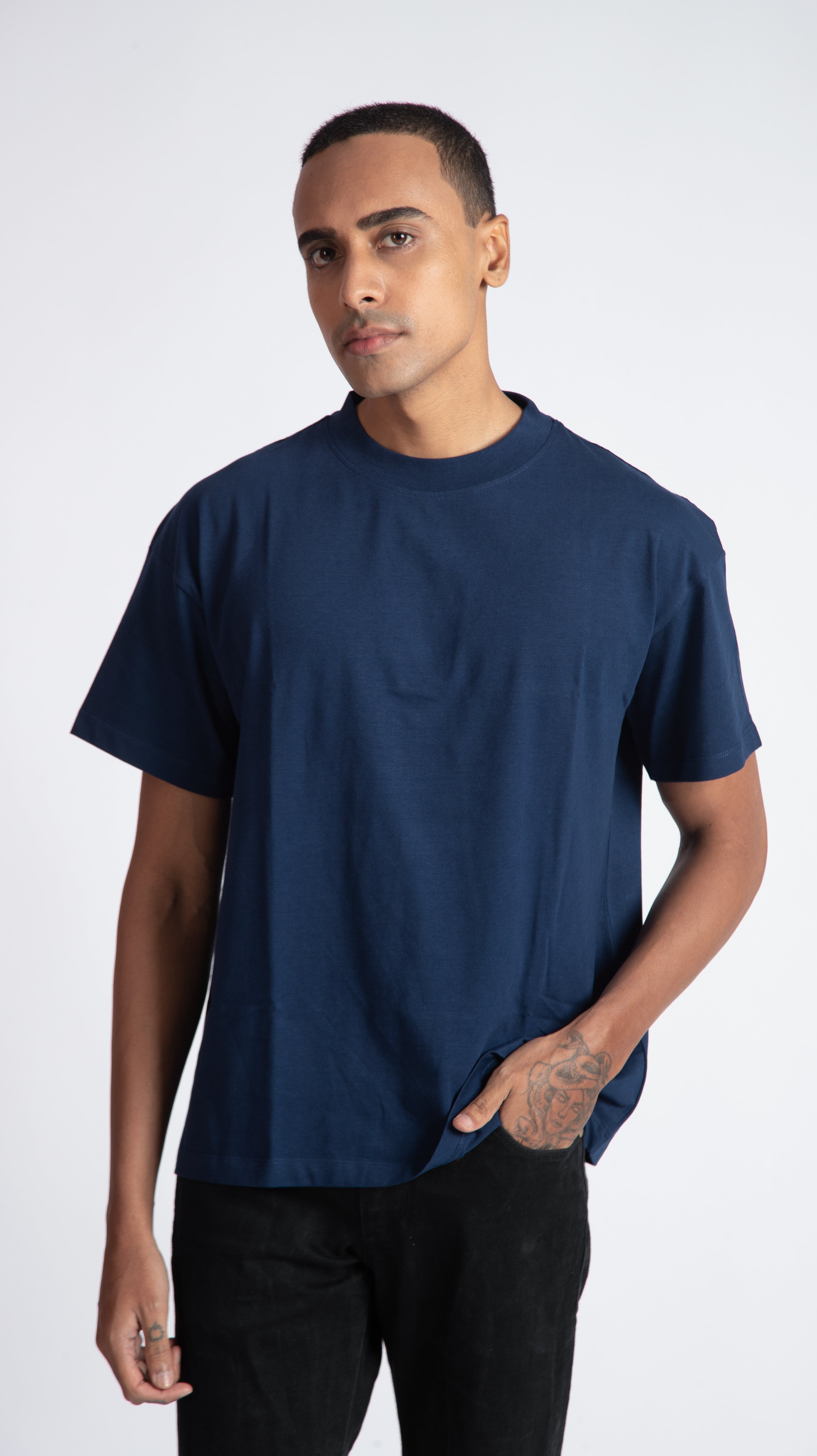 Stylera men's blue regular fit t-shirt worn by male model with hand in pocket