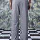 Back view of gray men's business casual trousers by Stylera worn with black shoes