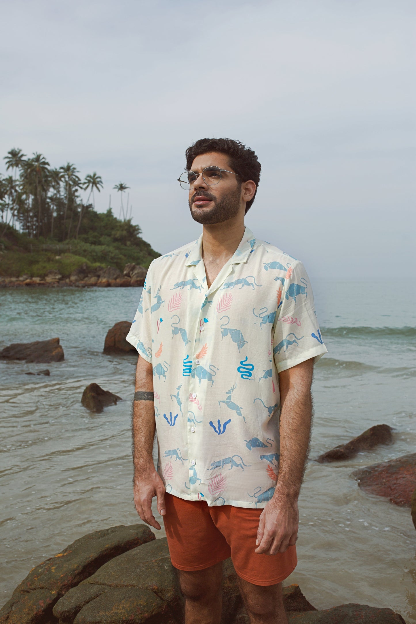 Men's cream oversize shirt with colorful print, perfect for beach outings or casual wear