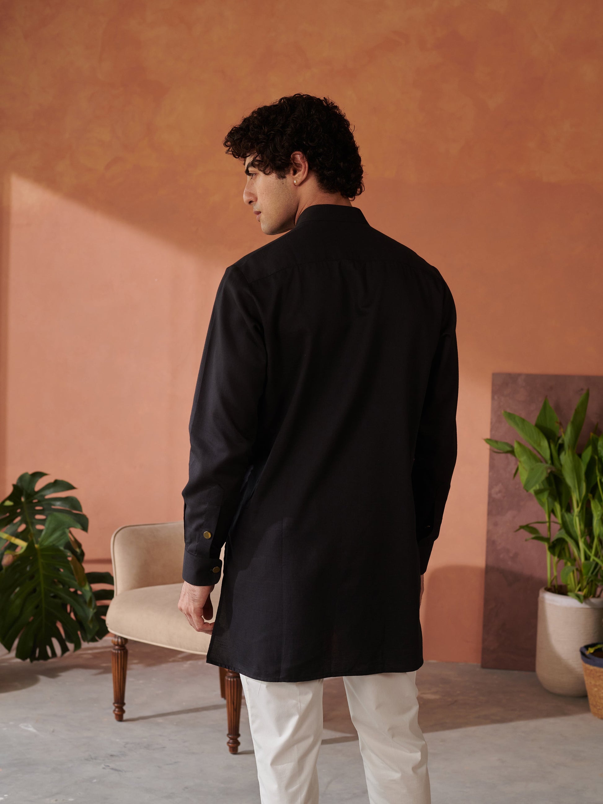 Stylish black mens designer Jodhpuri kurta with a modern silhouette and elegant design by Stylera 