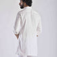 Men's ethnic kurta pant set in white, featuring a stylish back design and rolled sleeves