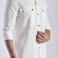 Men's ethnic kurta pant set in white with button details and patch pockets for a stylish casual look