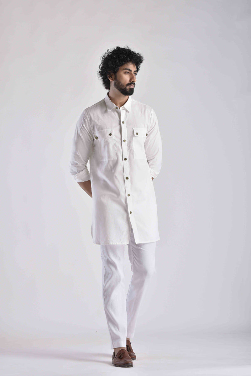 Stylish men's ethnic kurta pant set in white, featuring button-down design and slim fit