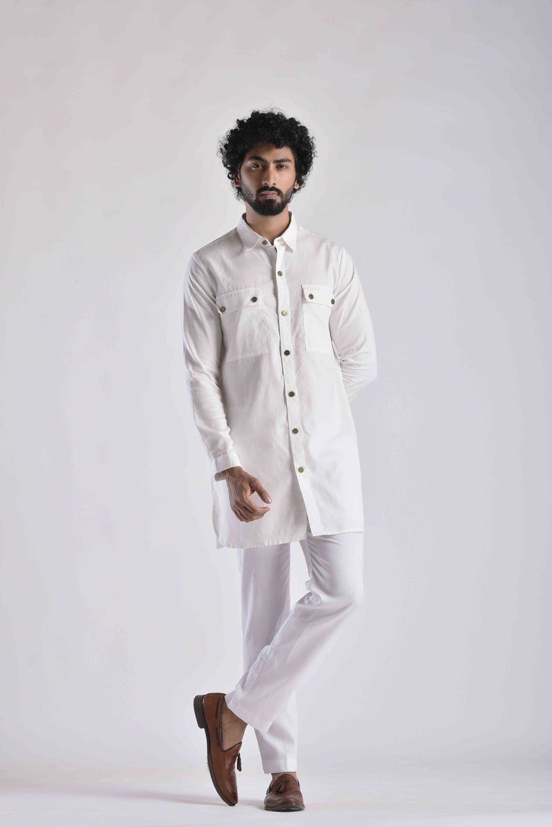 Men's ethnic kurta pant set in white with button details, perfect for festive occasions
