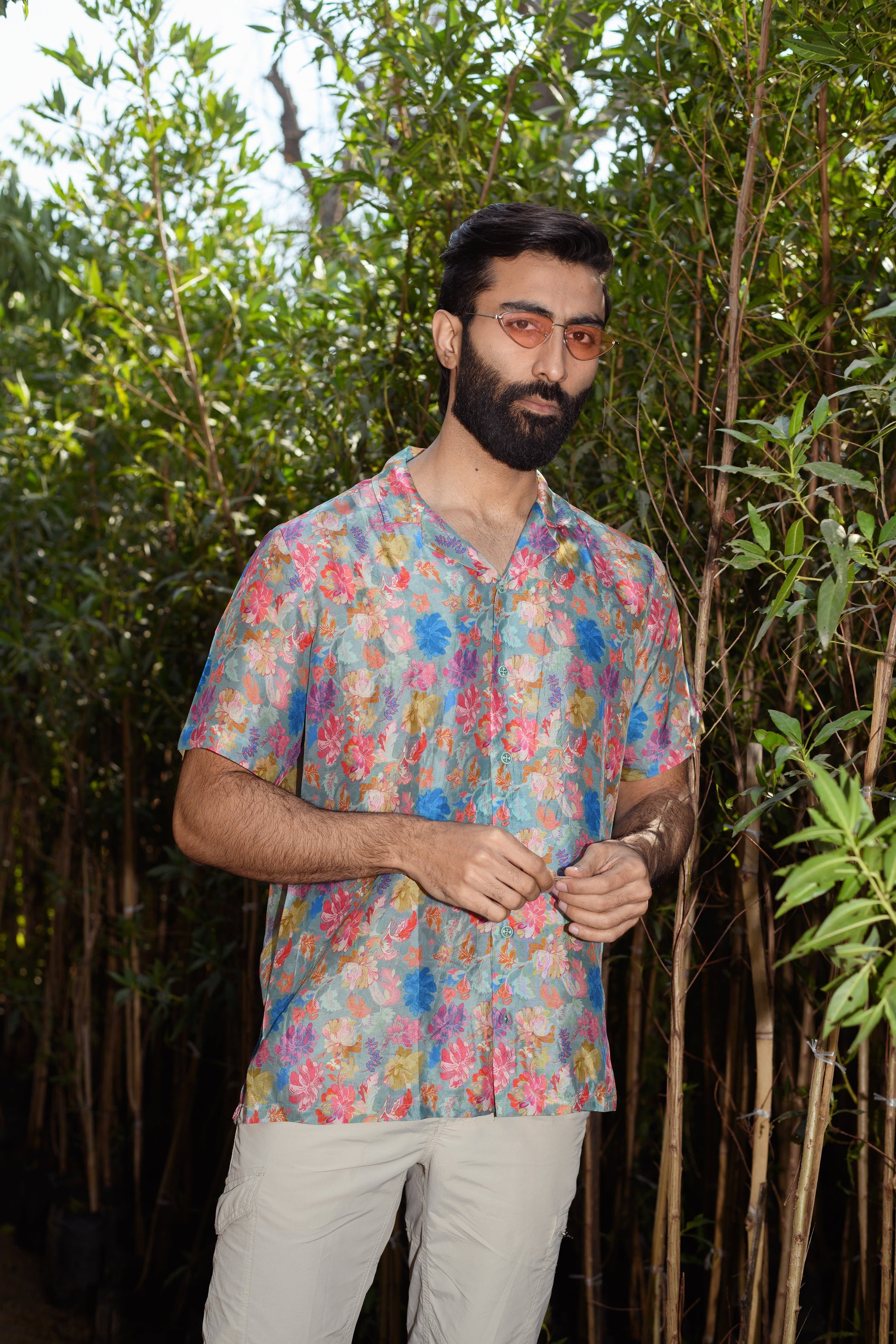 Men's floral Hawaiian shirt by Stylera featuring vibrant colors and a relaxed fit