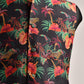 Men's floral printed bandi jacket by Stylera in vibrant jungle pattern with tropical leaves and animals