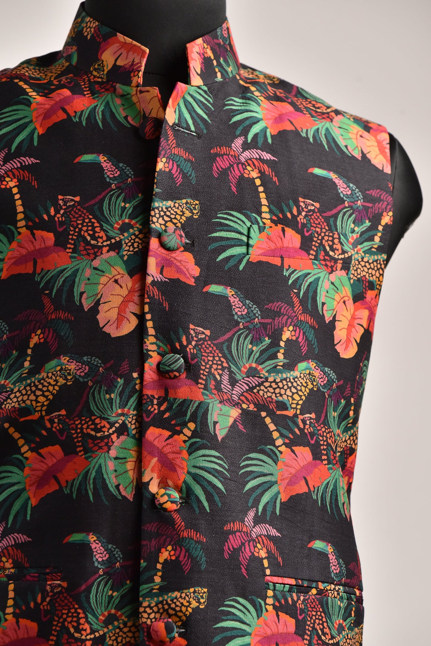 Men's floral printed bandi jacket by Stylera in vibrant jungle pattern with tropical leaves and animals