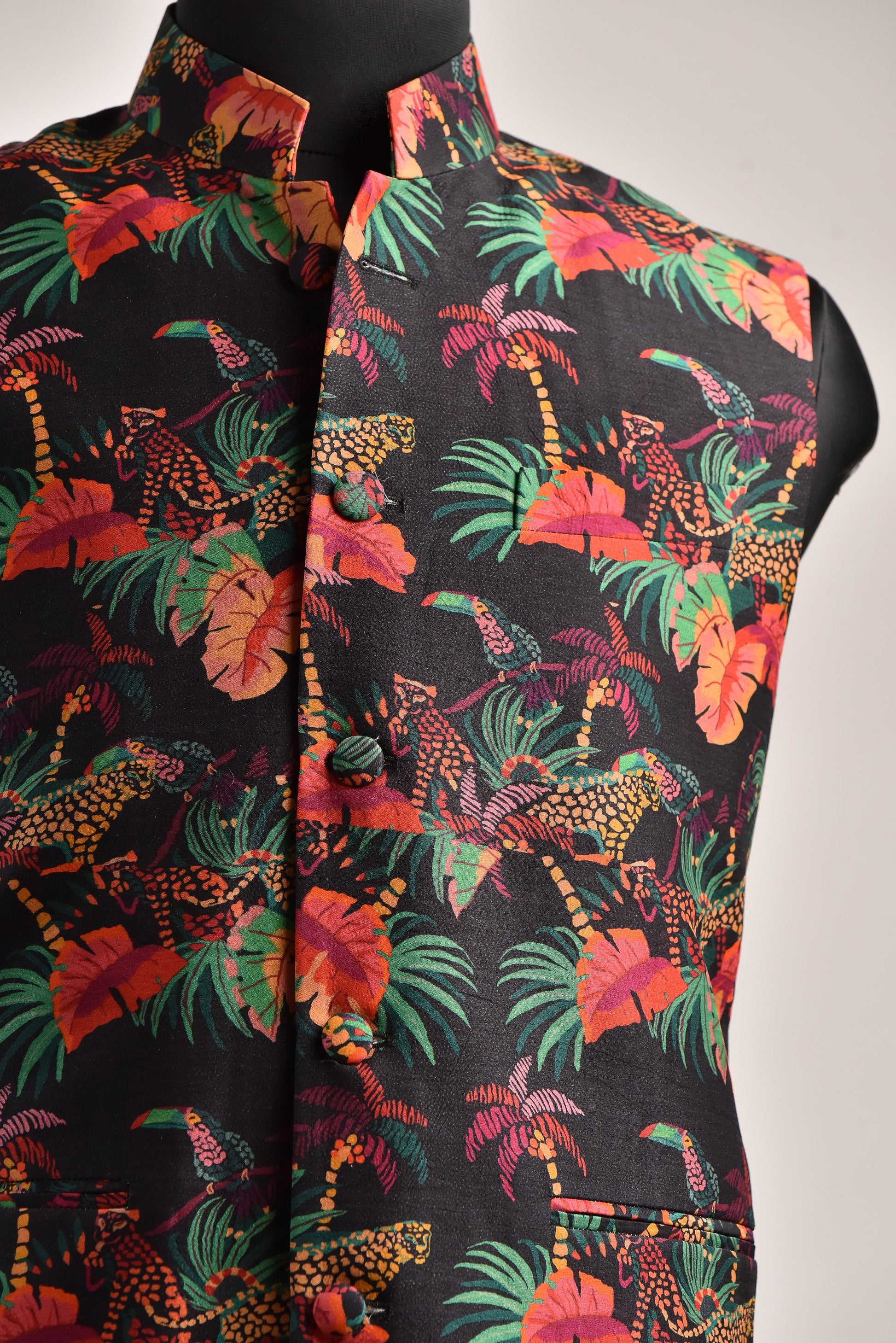 Men's floral printed bandi jacket by Stylera in vibrant jungle pattern with tropical leaves and animals