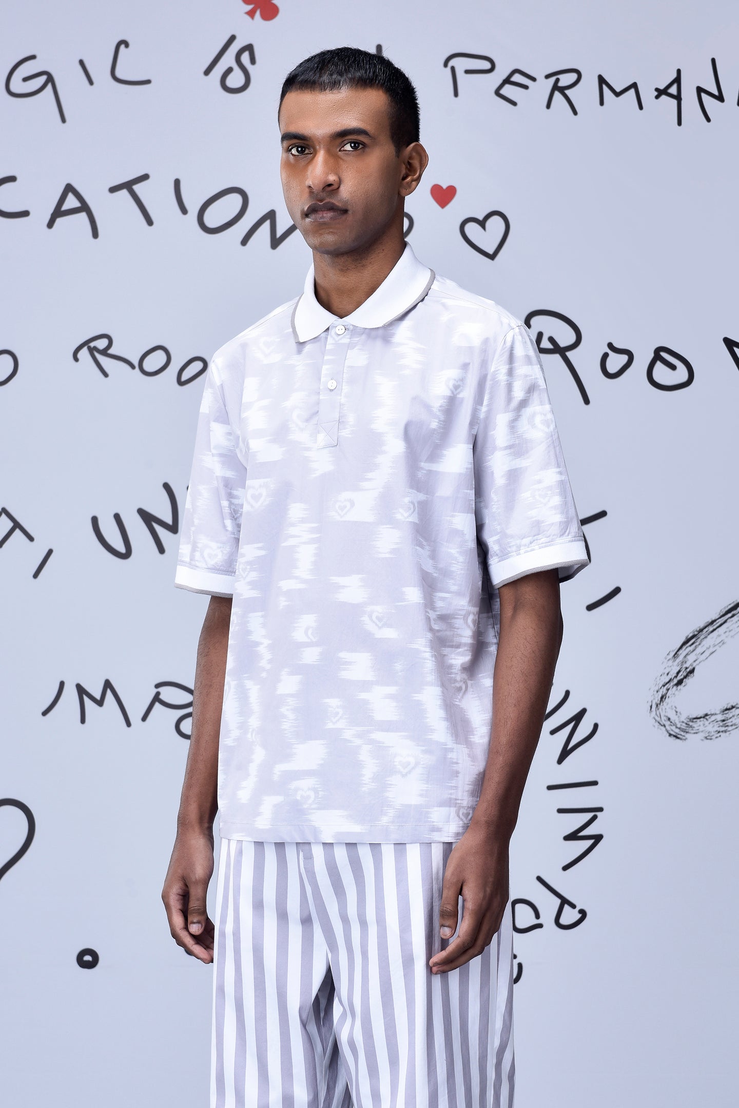 Stylera mens ikkat print polo in white with subtle patterns and short sleeves