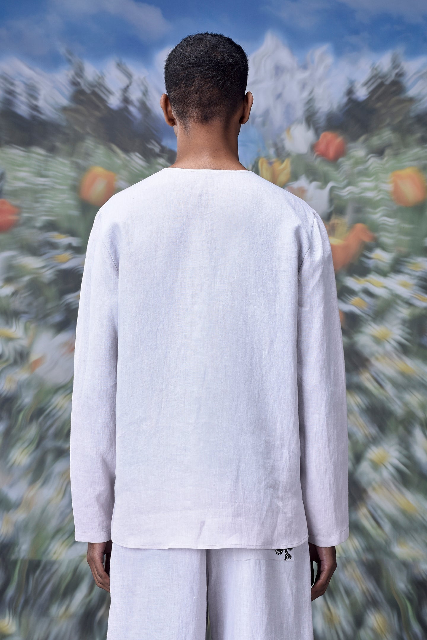 Back view of mens linen statement shirt by Stylera in white with long sleeves