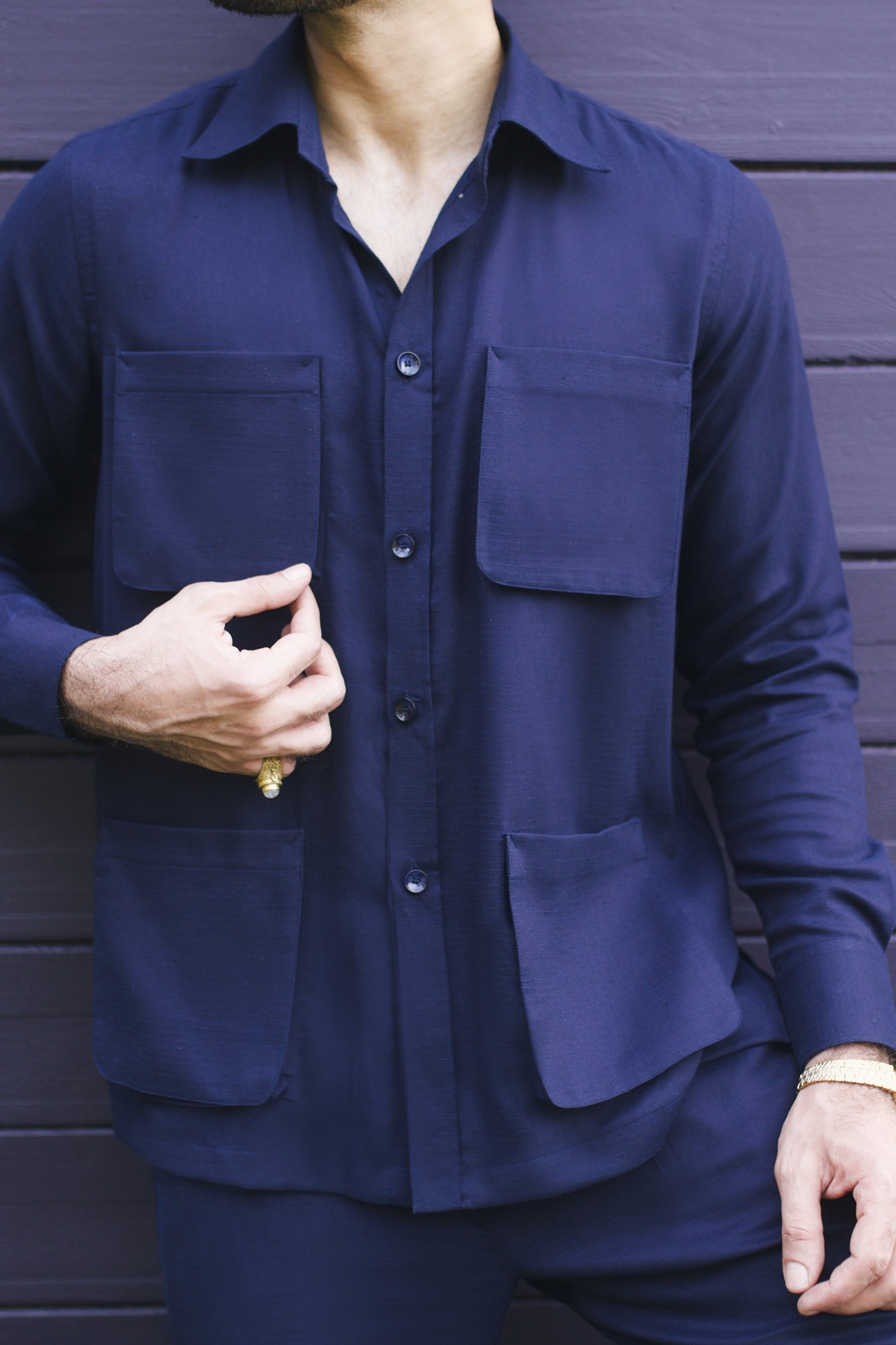 Men's matching outfit set featuring a navy button-up shirt with two front pockets