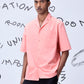Men wearing a pink mens overlapping pocket shirt by Stylera with short sleeves