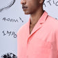 Stylera mens overlapping pocket shirt in pink worn by male model