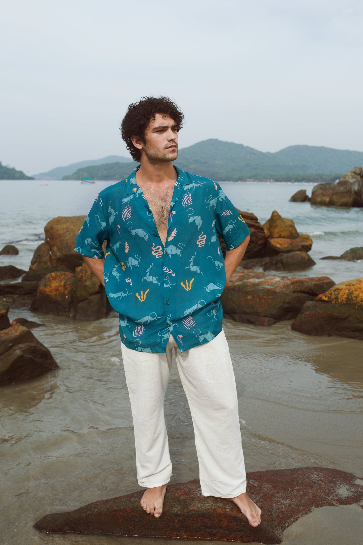 Men's oversized beach shirt by Stylera in turquoise with colorful patterns, perfect for summer outings
