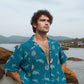 Men's oversized beach shirt by Stylera in blue with tropical patterns, perfect for summer outings