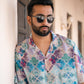 Men's oversized patterned shirt by Stylera with vibrant colors and relaxed fit for casual style