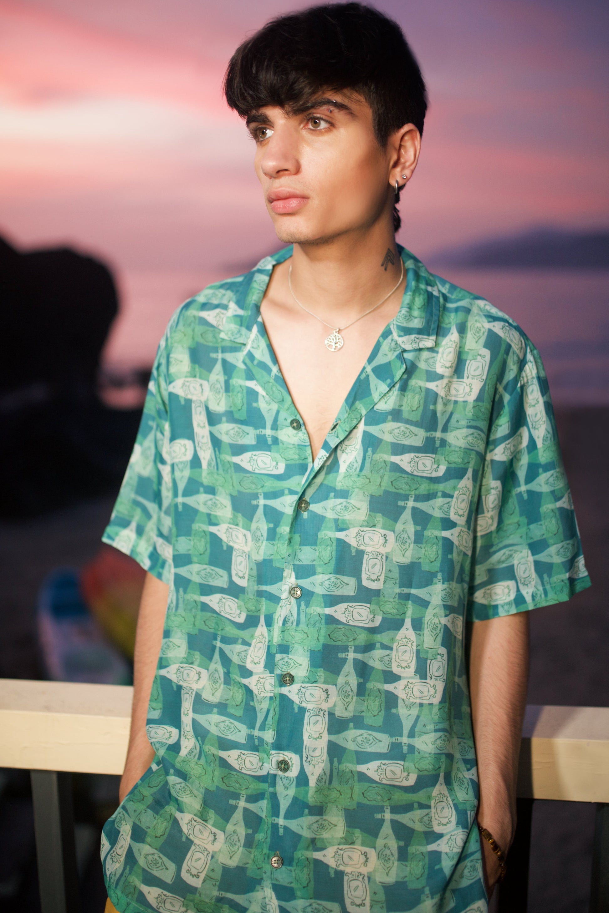Men's oversized printed shirt by Stylera with a vibrant abstract design, perfect for casual summer outings.