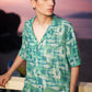 Mens oversized printed shirt from Stylera featuring a stylish pattern in green shades