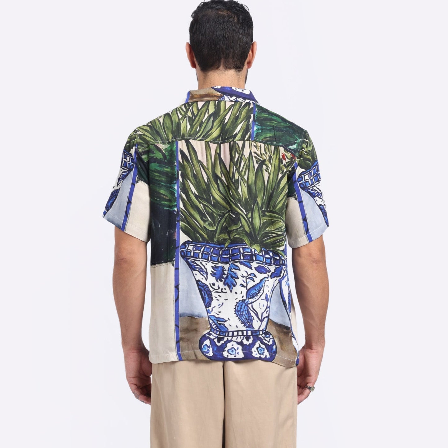 Men's patterned short sleeve shirt by Stylera featuring a colorful design with plant motifs