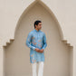 Men's printed kurta with butterfly design in blue, featuring traditional styling and elegant details