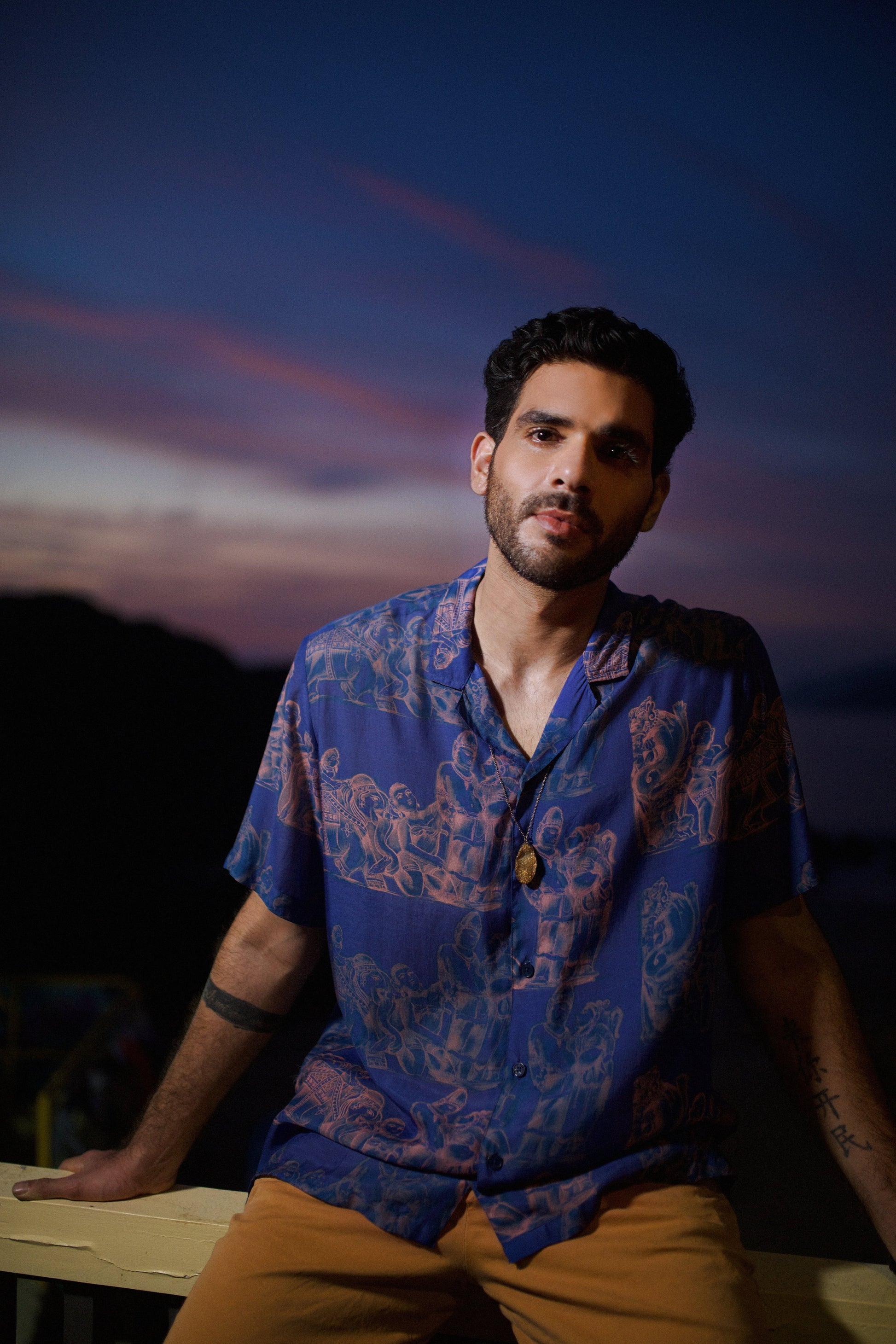 Men's printed oversized casual shirt by Stylera in vibrant blue with unique designs
