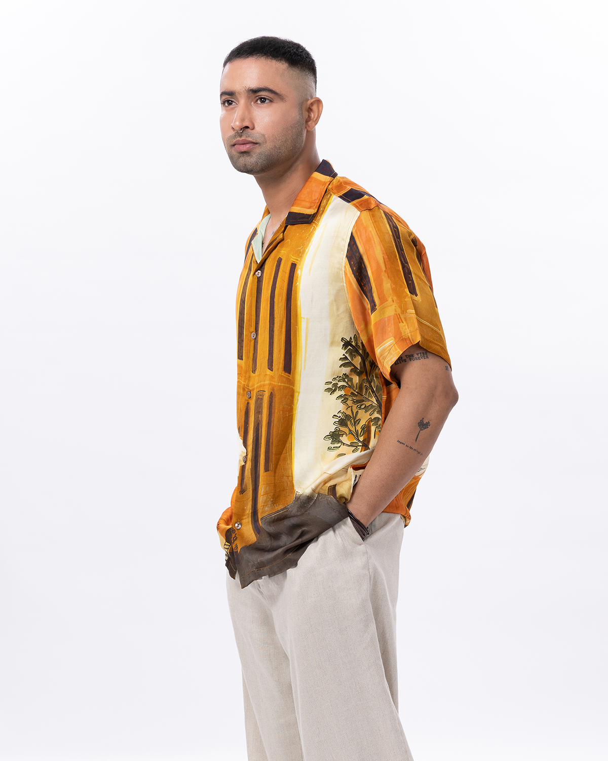 Stylera men's printed short sleeve shirt featuring a vibrant orange and yellow design for a stylish summer look