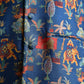 Men's printed silk Nehru jacket with vibrant colorful patterns featuring elephants and trees