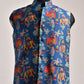 Men's printed silk Nehru jacket with vibrant colors and intricate patterns for stylish occasions