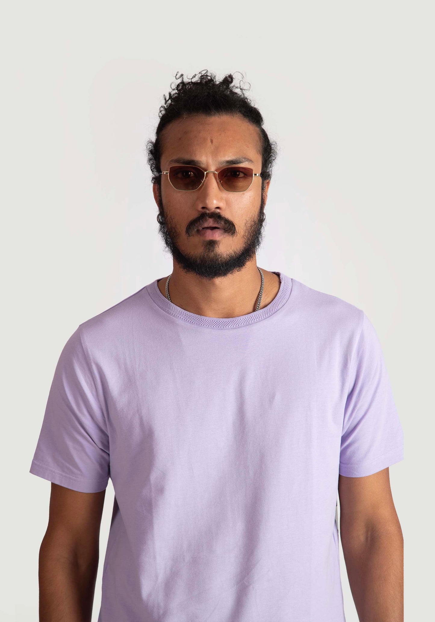 Stylera men's regular fit lavender tee worn by a model with sunglasses and a beard