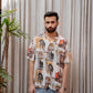 Men's statement oversized shirt by Stylera with colorful prints and short sleeves, perfect for a relaxed style