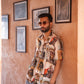 Men's statement oversized shirt featuring colorful artistic prints and a relaxed fit for casual style