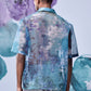 Back view of a men's summer organza shirt by Stylera in blue and purple abstract pattern