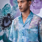 Men wearing Stylera men's summer organza shirt with blue and purple abstract floral design