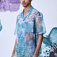 Men wearing a men's summer organza shirt by Stylera with blue abstract patterns