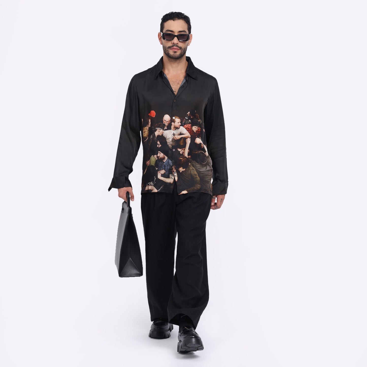 Stylera men's trendy statement shirt featuring an artistic print, paired with stylish black pants
