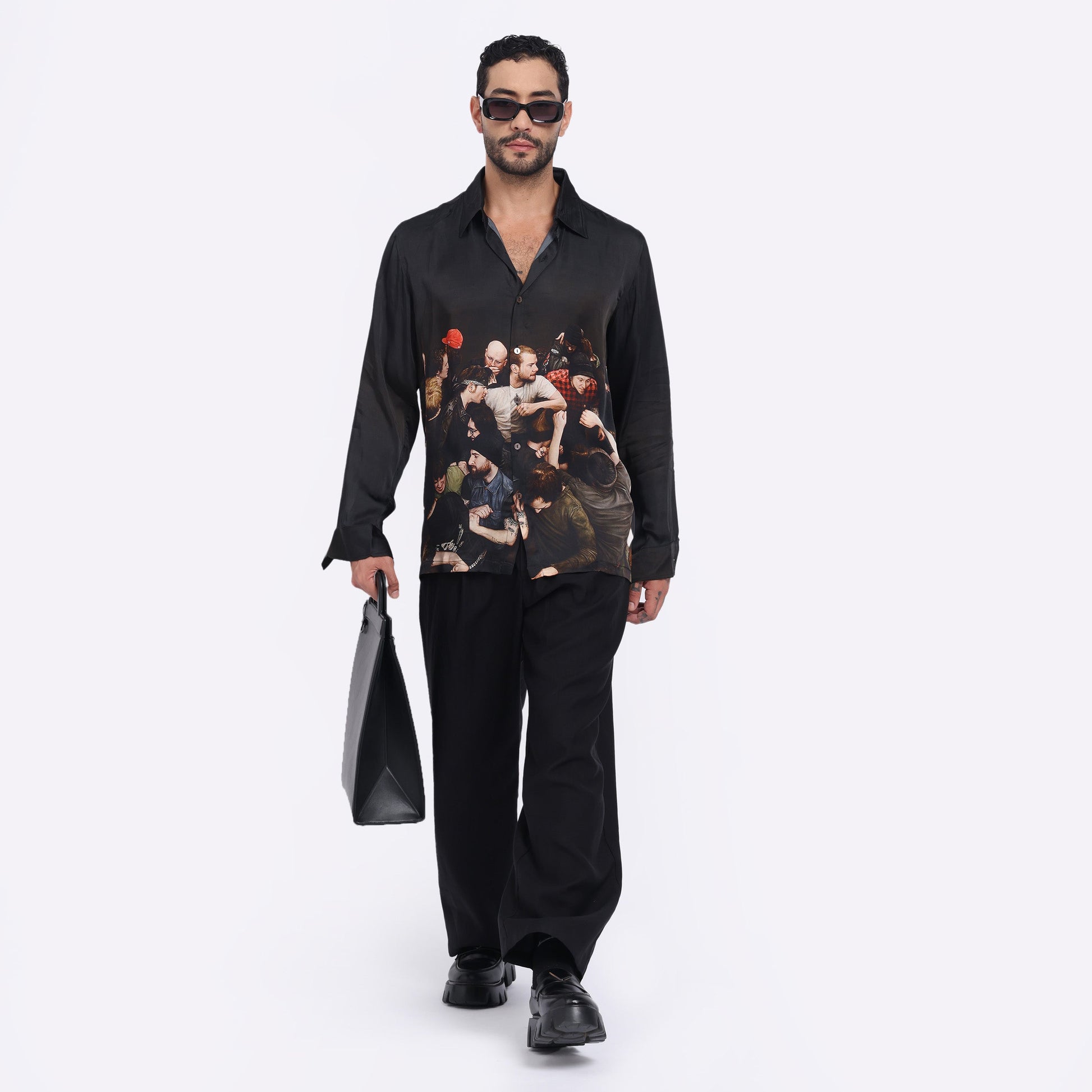 Stylera men's trendy statement shirt featuring an artistic print, paired with stylish black pants