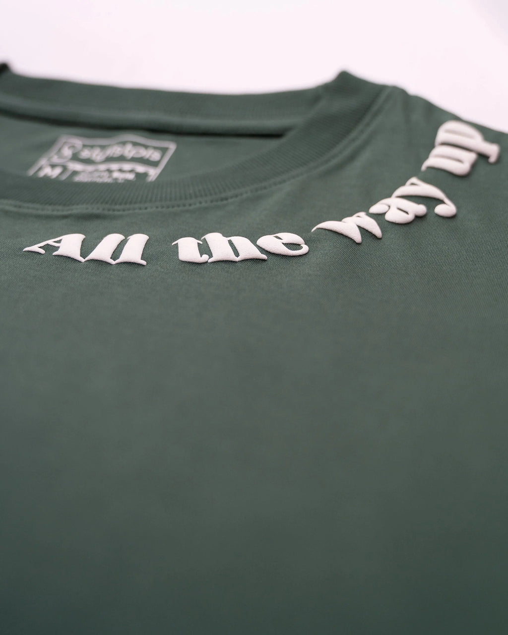 Stylstpls men's trendy streetwear t-shirt in green with unique text design on the neckline