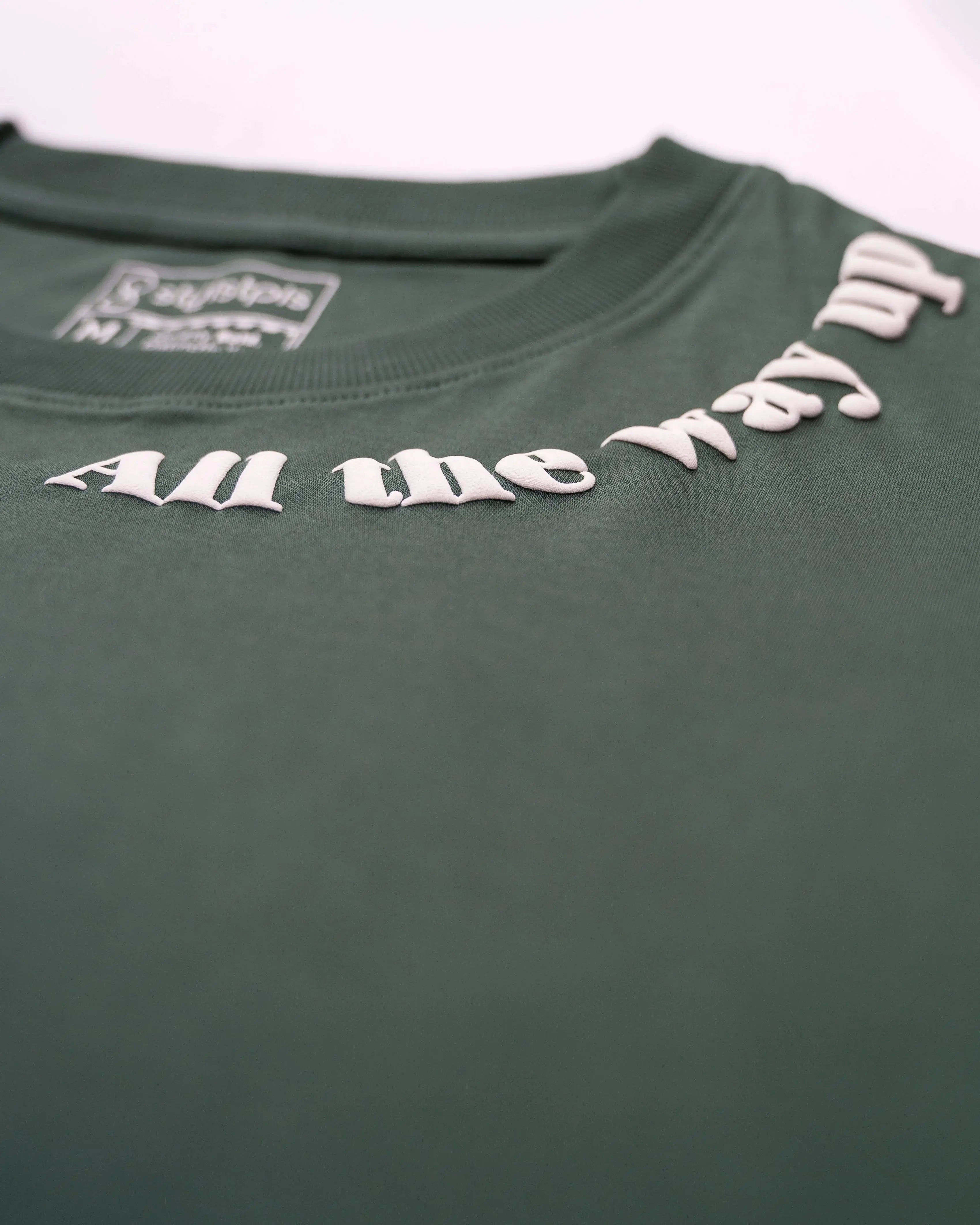 Stylstpls men's trendy streetwear t-shirt in green with unique text design on the neckline